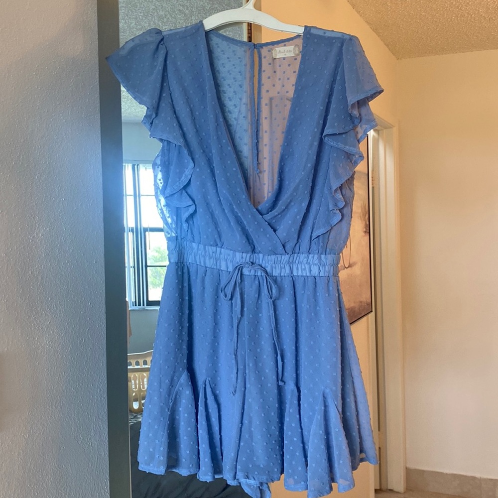 Fun and flirty romper. Lined with sheer back. Altar’d state romper